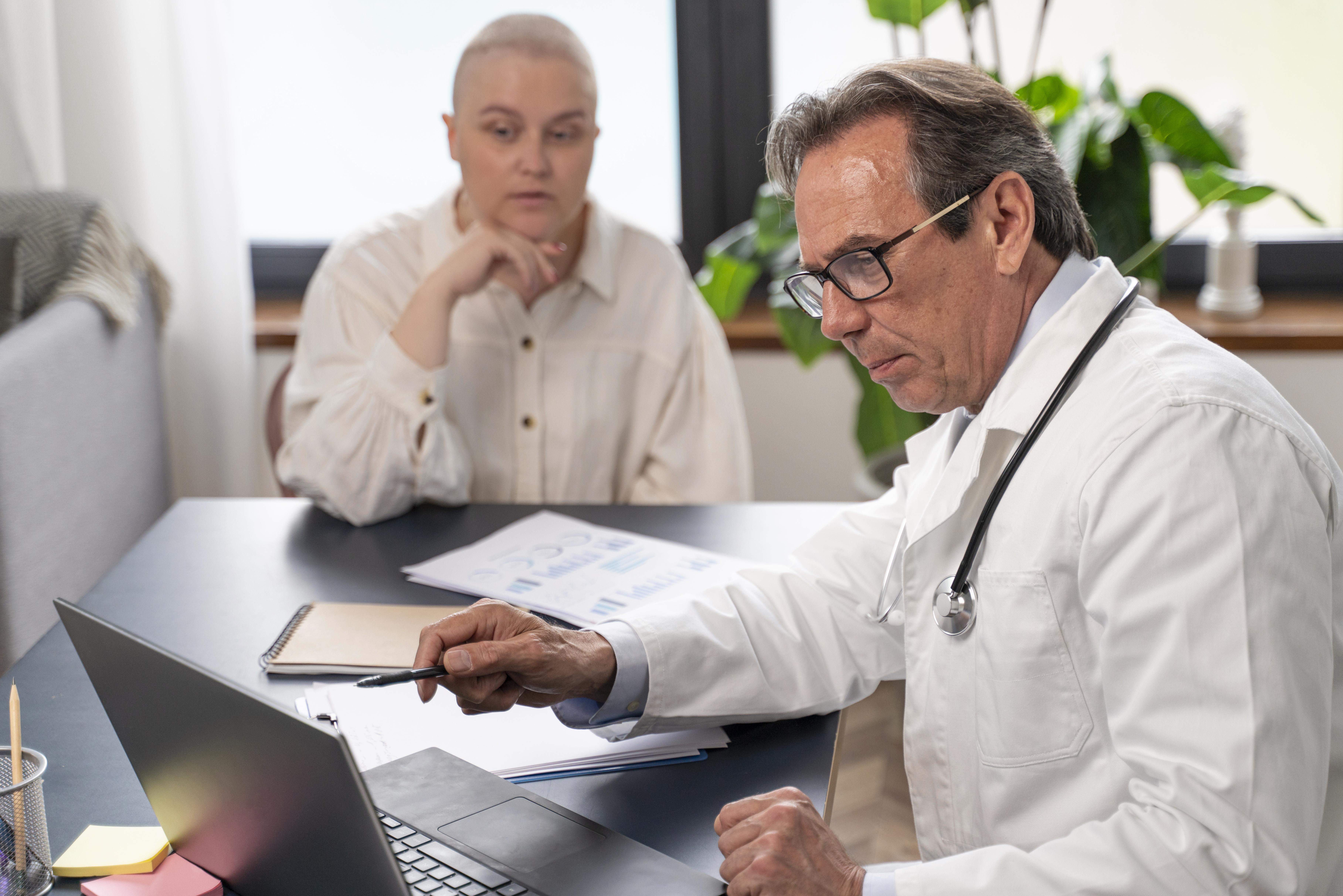 A doctor dicussing behavioral reports with the patient.