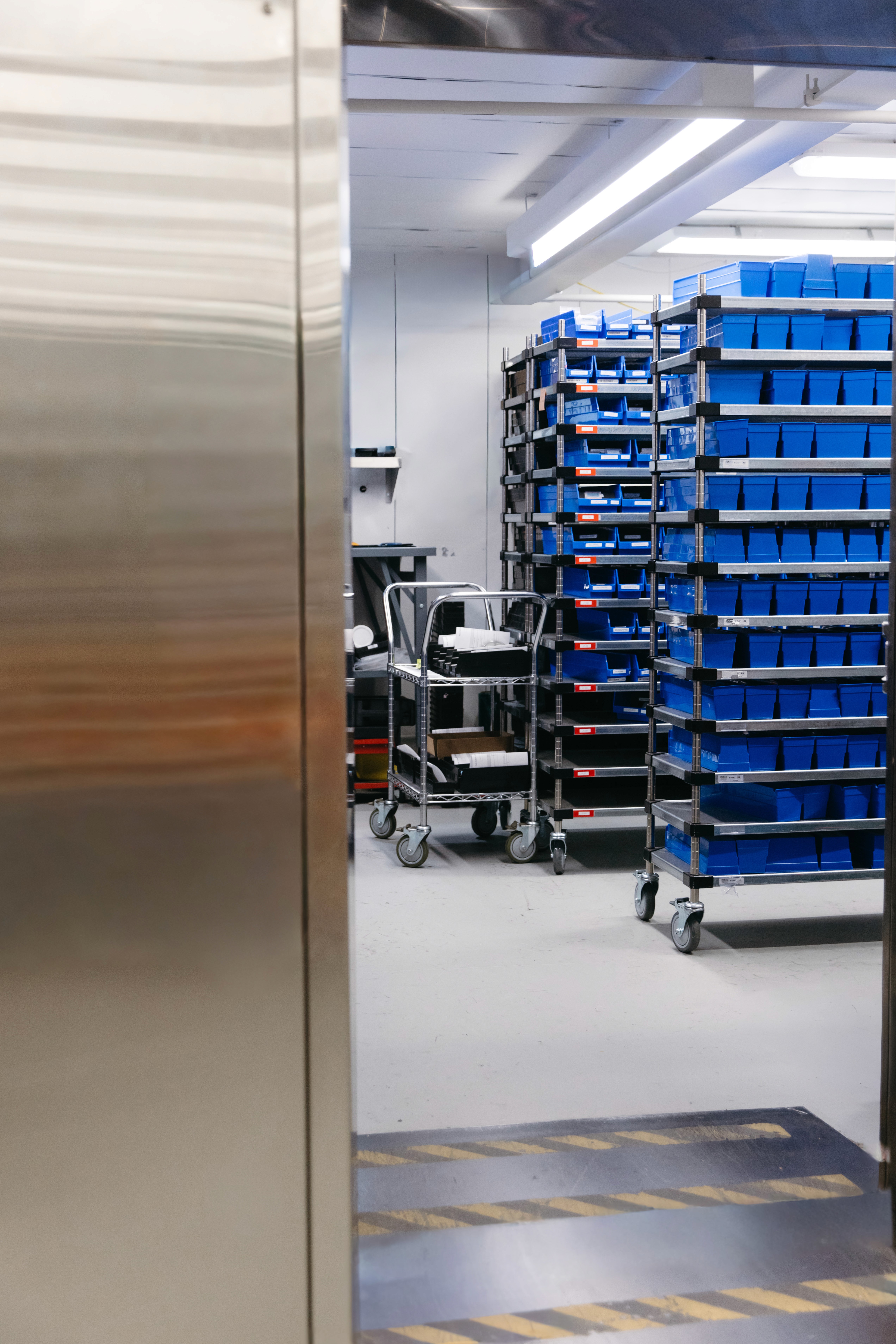 Interior view of Upstate's secure wholesale inventory facility with organized bullion storage.