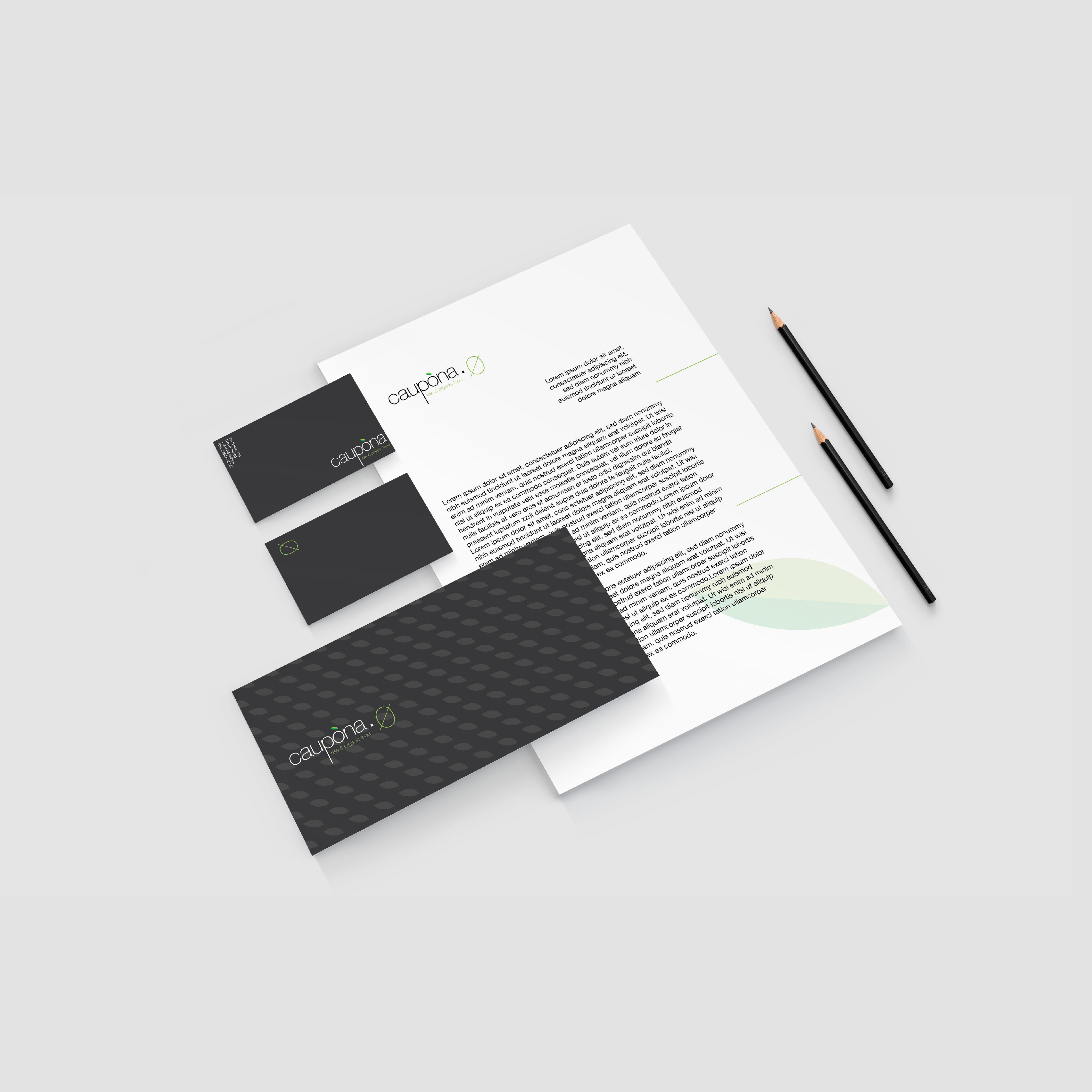 Caupona brand stationery set including business cards, envelope, and letterhead on a light grey surface.