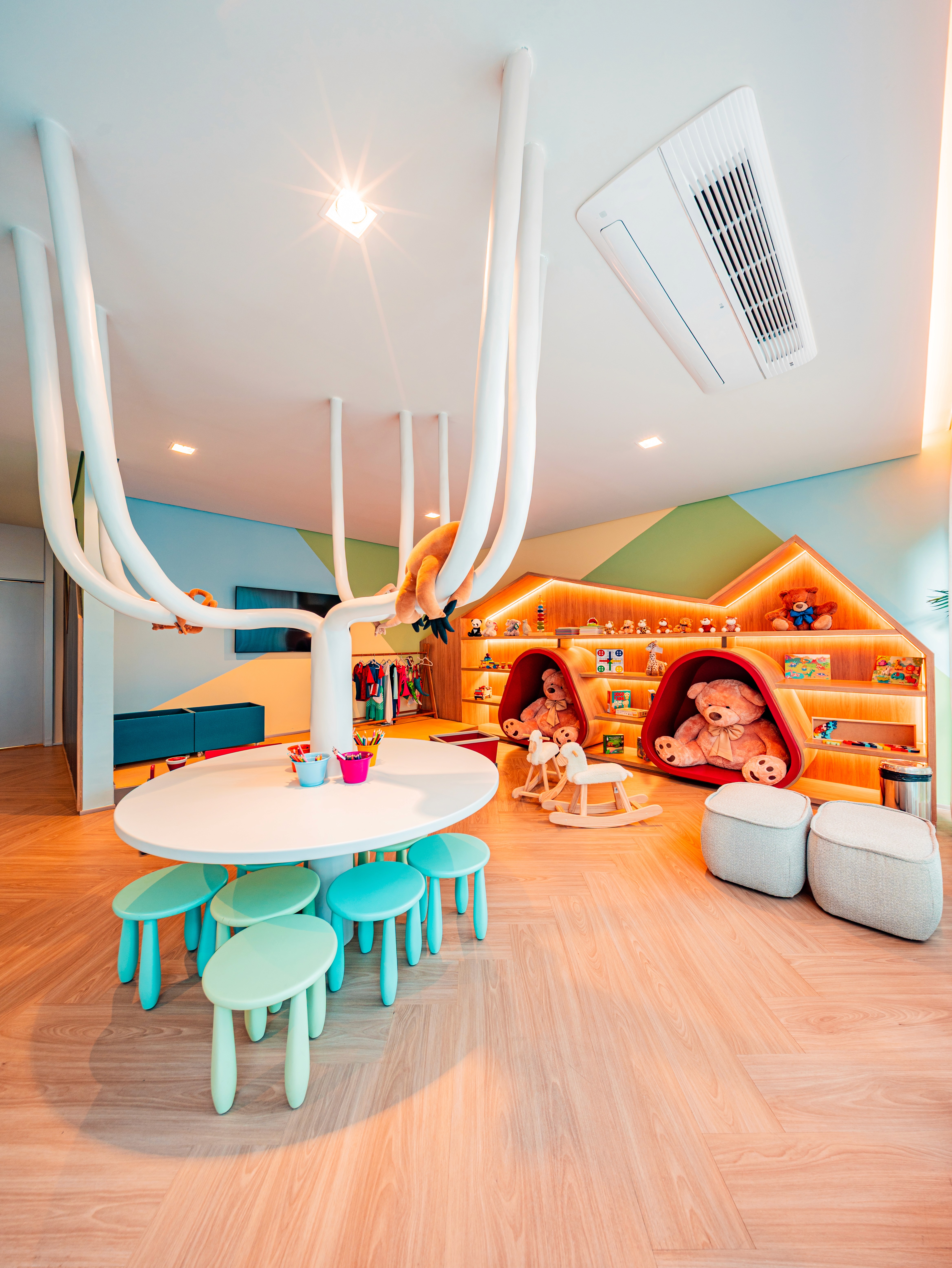 Curved modern skyscraper against a clear blue sky.