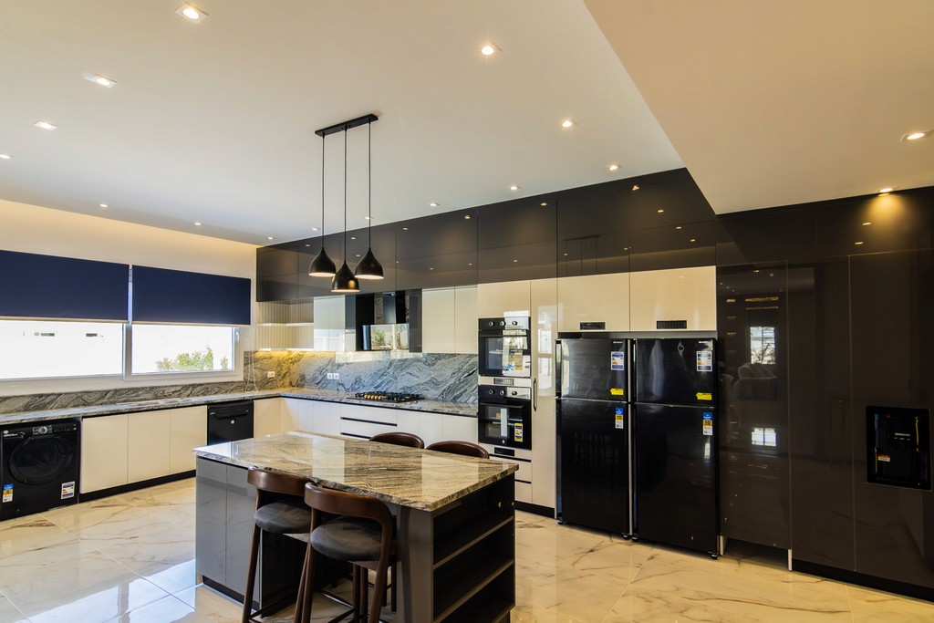 white and brown concrete building under blue sky during daytime