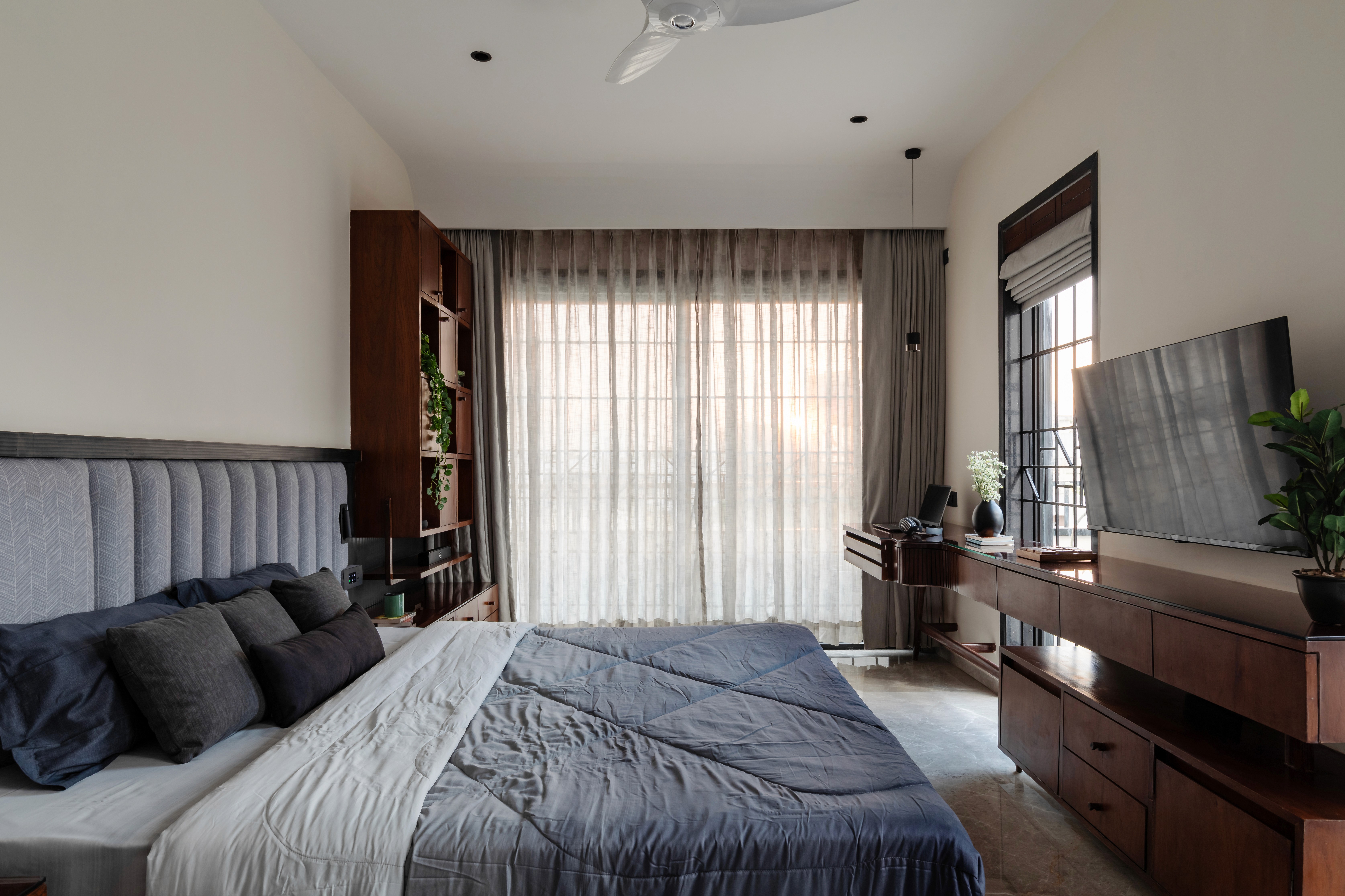 a woman holding a red flower