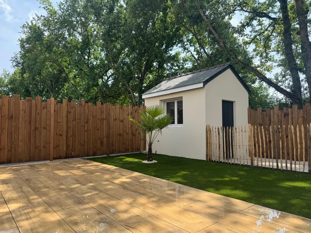Beautiful landscaped garden with greenery and outdoor design elements.