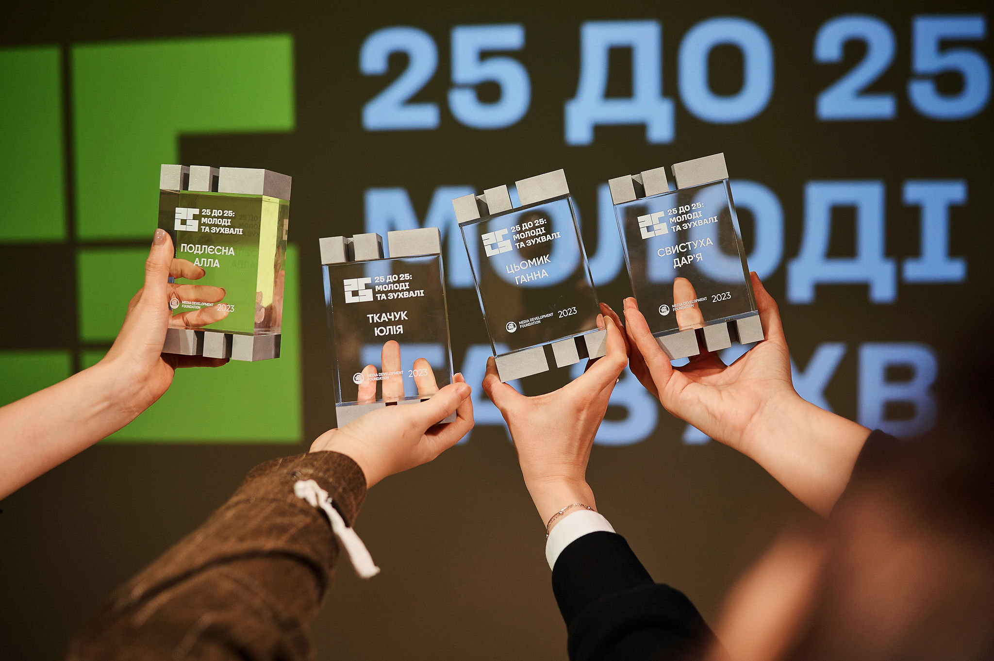 Panel discussion at an AI conference featuring experts in product, technology, and business.