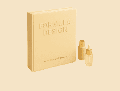 Golden liquid serum being dispensed into a ripple-textured dish, accompanied by a sleek applicator — evoking sensorial refinement, formulation control, and premium cosmetic engineering.