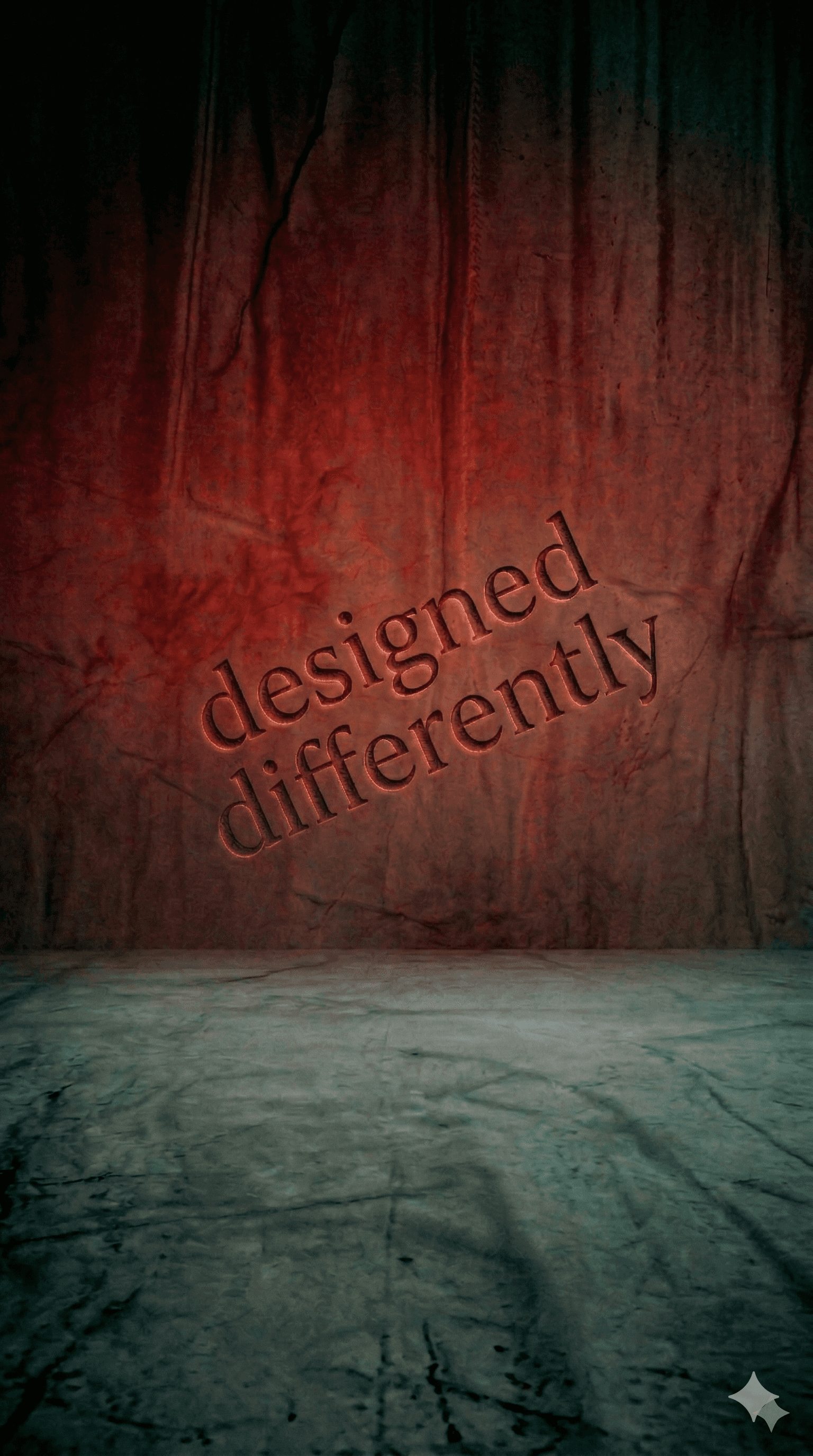 Text "designed differently" embossed on a textured red and green background, creating a striking visual contrast.