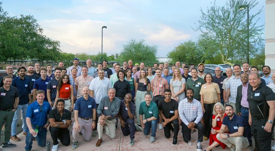 a black and white living room with a large tv