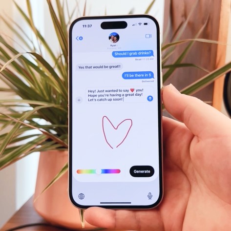 A photo of a phone with text messages and a drawing of a heart beneath it