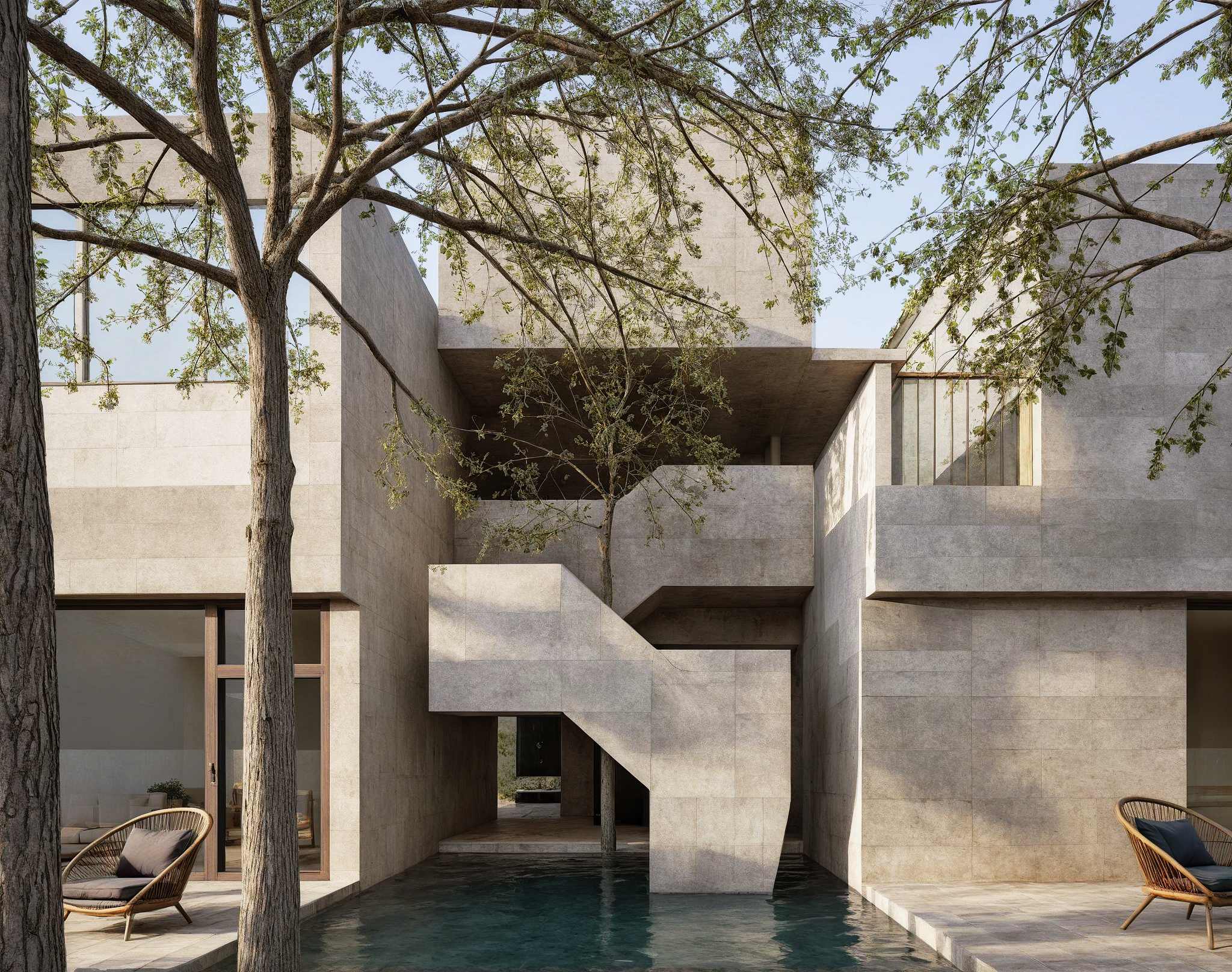 現代清水模建築圍繞中庭水景設計，樹木穿插於建築間，展現自然與建築的融合