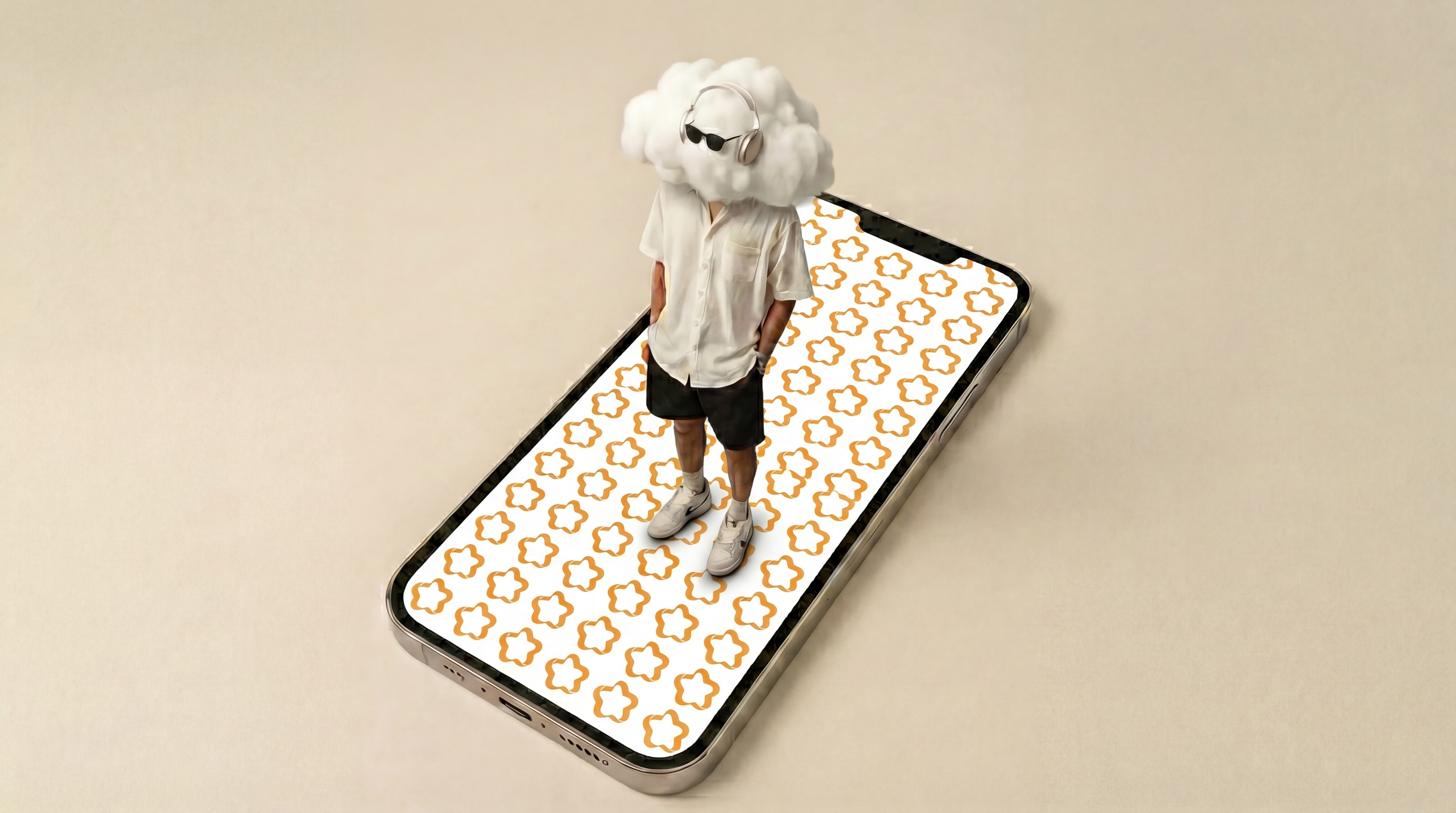 Image of a men standing on top of a iphone with a wallpaper full of OM Creative logo. 