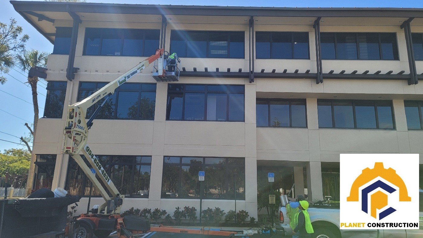 Professional building facade cleaning on a Fort Lauderdale commercial property — Planet Construction FL