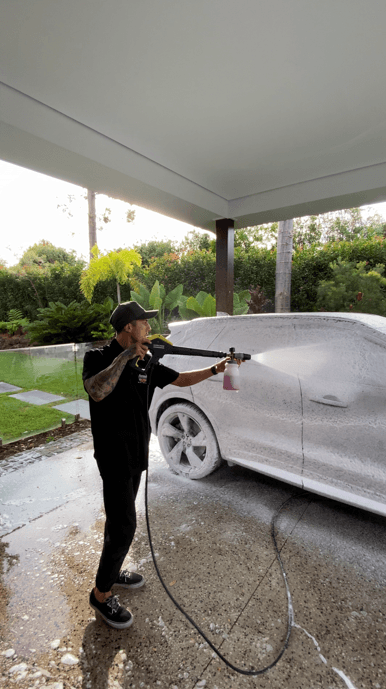 Small dog pulling kid with his leash