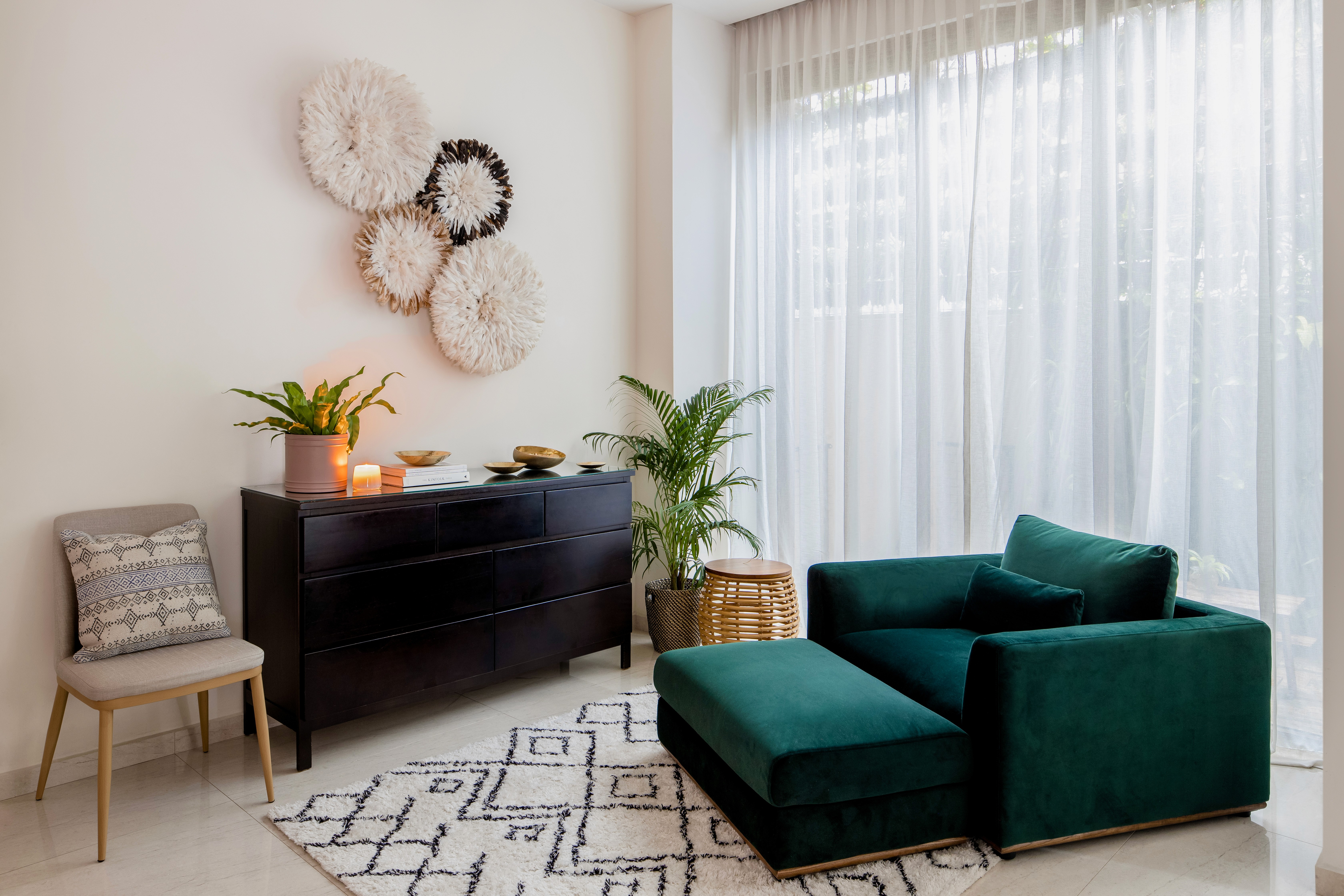 Boho chic sitting room with a mix of patterns, textures, and colors by Ventura & Los Angeles interior designer Jubilee Interiors