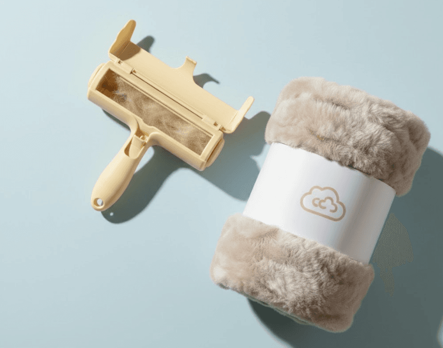 Two professionals collaborate at a desk, discussing a project displayed on a computer screen in a modern office setting.