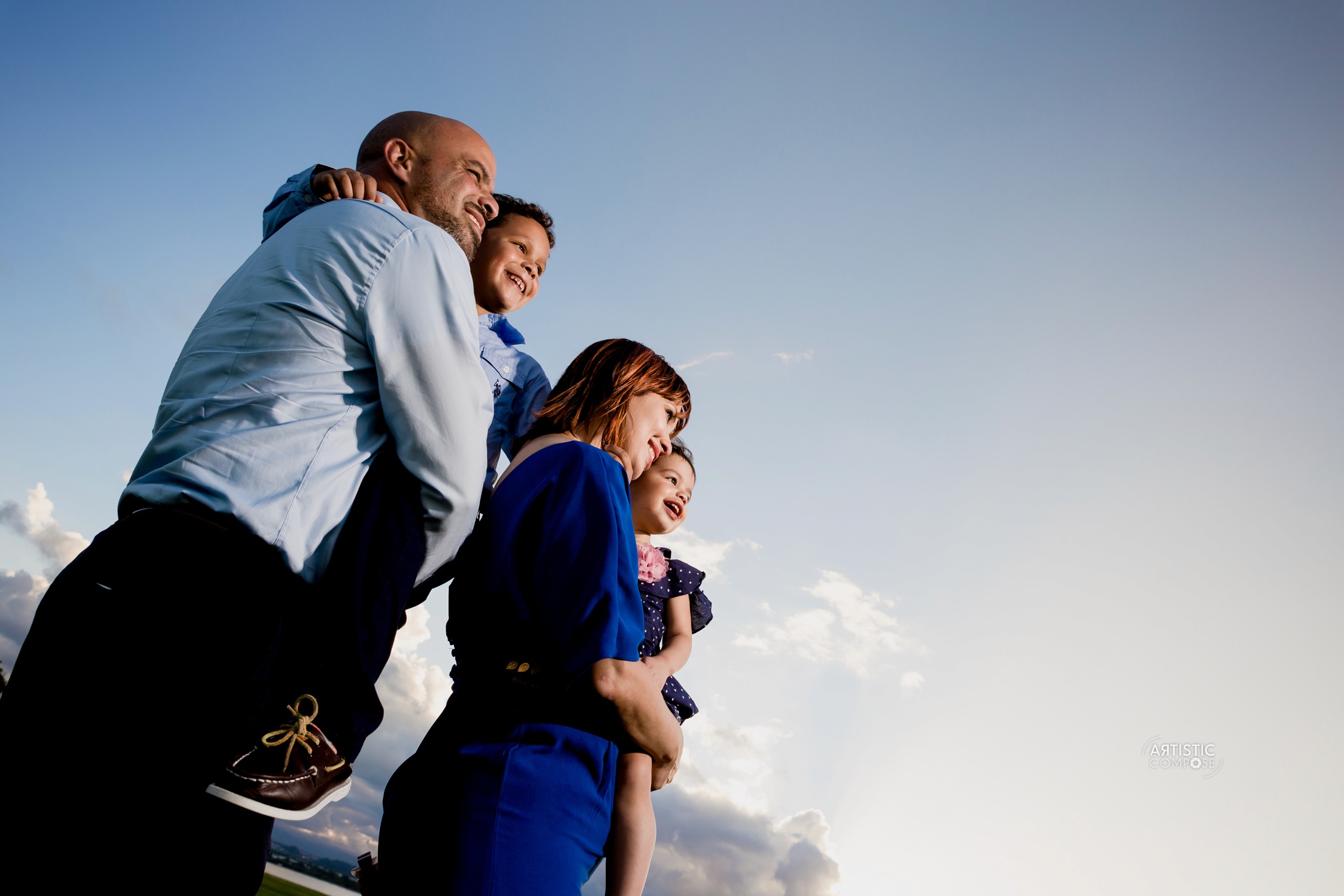 Bride in white dress walking on street, blurred motorcycle passing