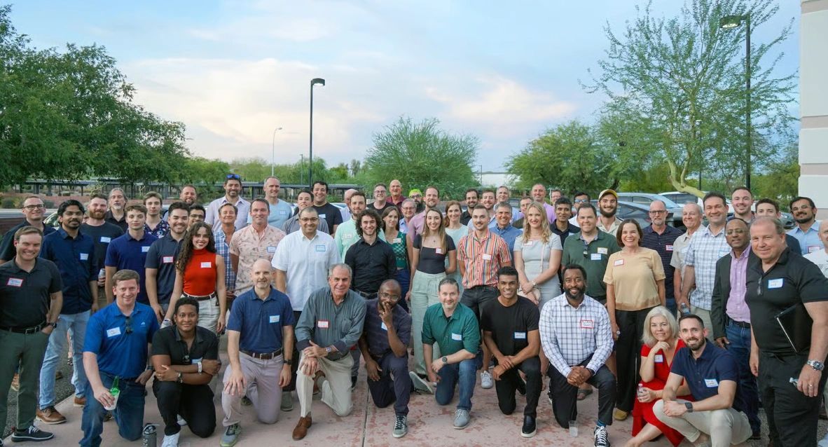 a black and white living room with a large tv