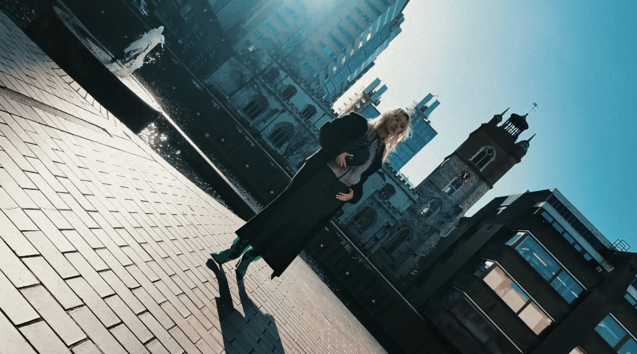 Shiba Inu dog jumping to catch falling autumn leaves