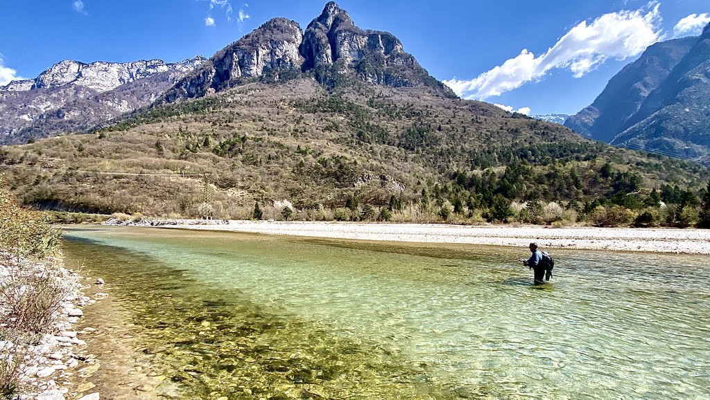 Best fishing guides in Europe casting in a pristine river