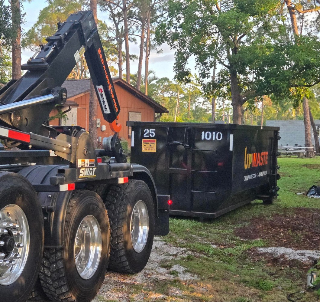 Dumpter outisde of a residential house