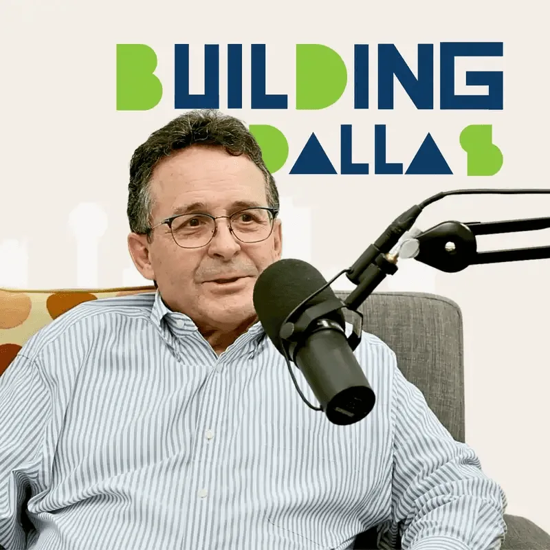 guest speaking into microphones with “Building Dallas” branding
