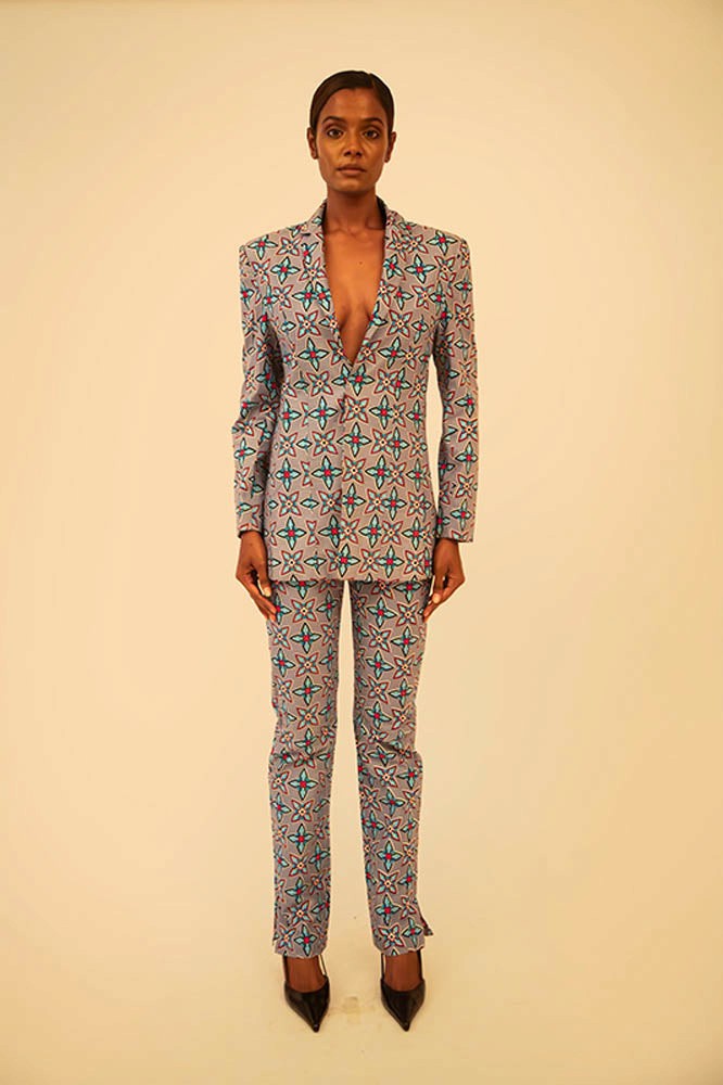Vintage abstract print oversized blazer and pant set featuring a relaxed fit and bold coordinated design, thrifted from global vintage collections.