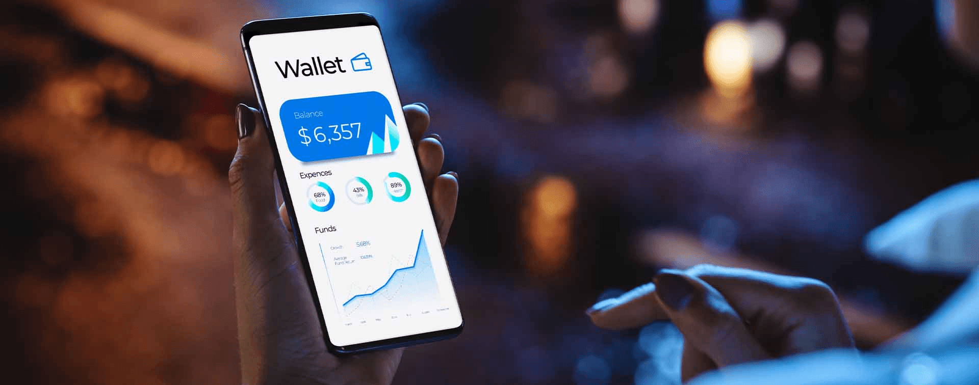 Person holds smartphone showing wallet app - How to Withdraw Money From an OnChain Wallet