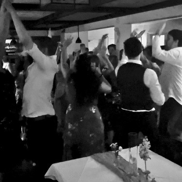 Guests dancing and having a blast on the dance floor at a wedding in Muskoka, with NightStyle DJs creating an energetic and unforgettable atmosphere.