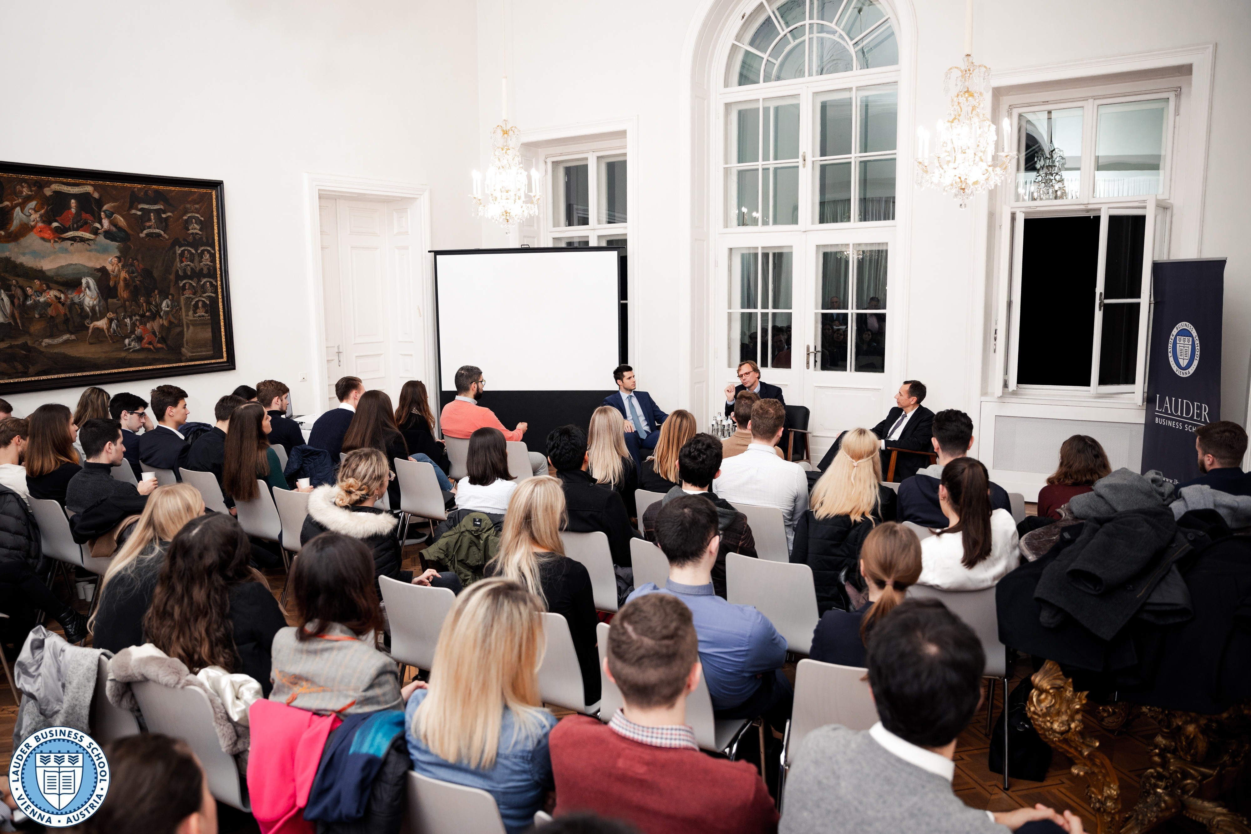 Dr. Andreas Bierwirth, CEO of Magenta Telekom together with Dr. Tamas Csermely, Director of Graduate Studies at LBS and Mr. Alexander Zirkler, Executive Director talking to LBS students