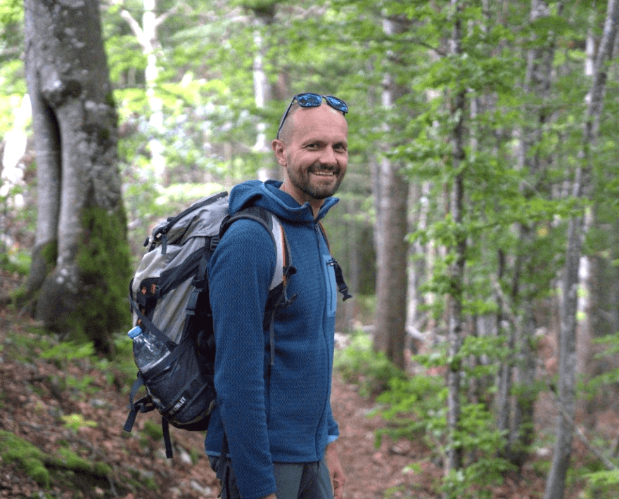 person sitting in a chair in front of a man