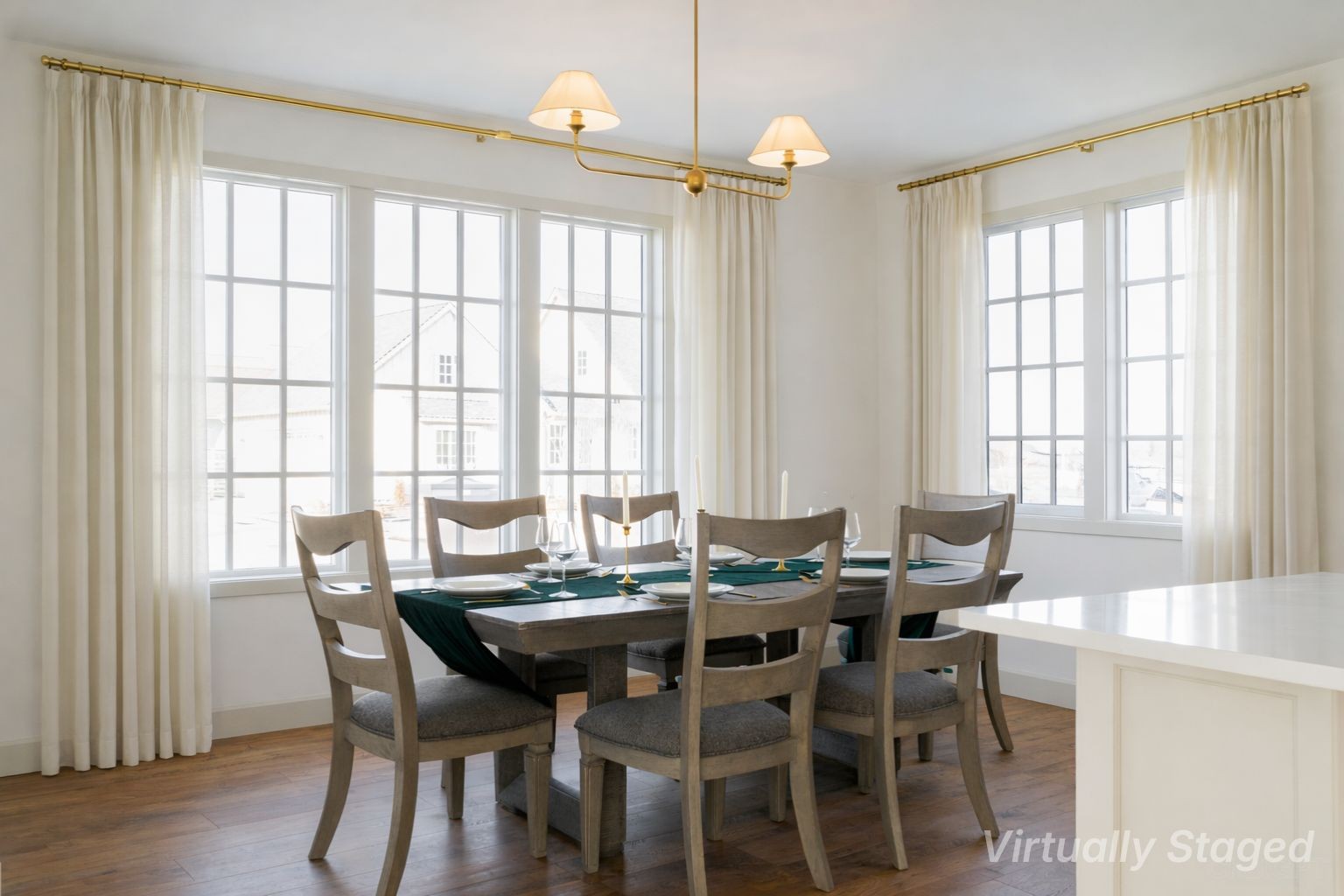Dining room virtually staged with cream linen curtains.