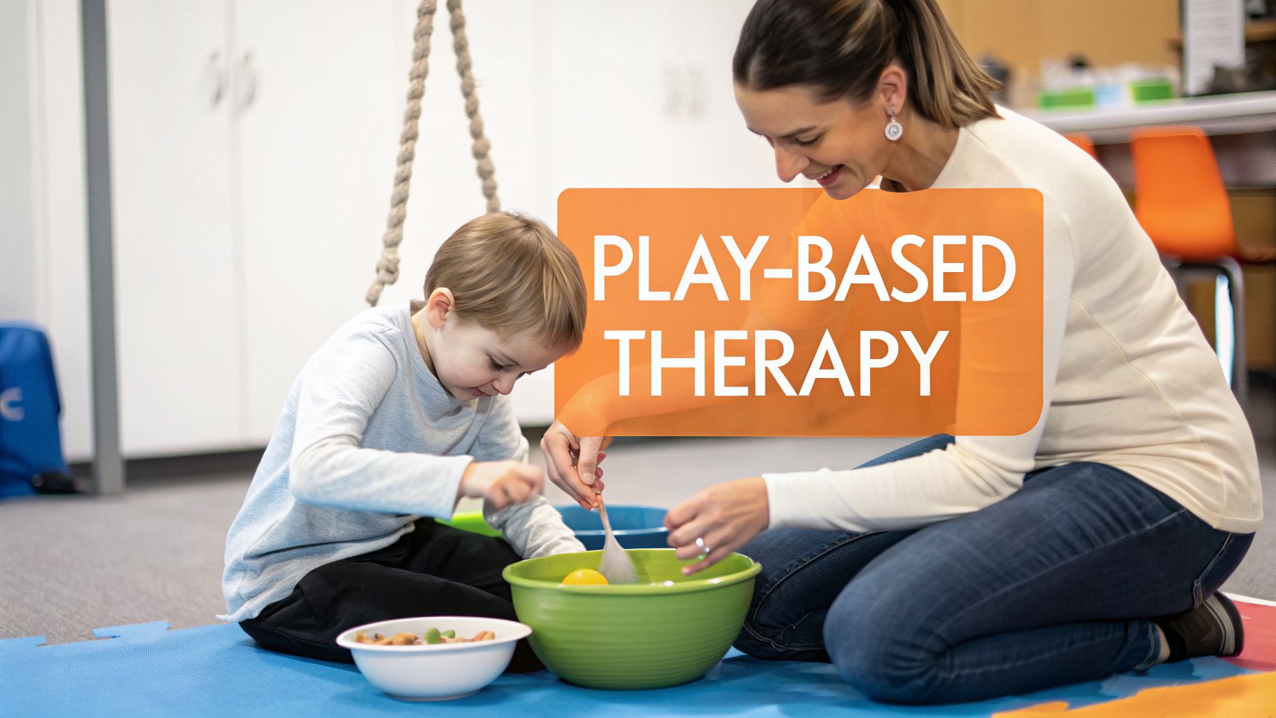 A child and an adult therapist sit on the floor, engaged in play-based therapy with bowls.