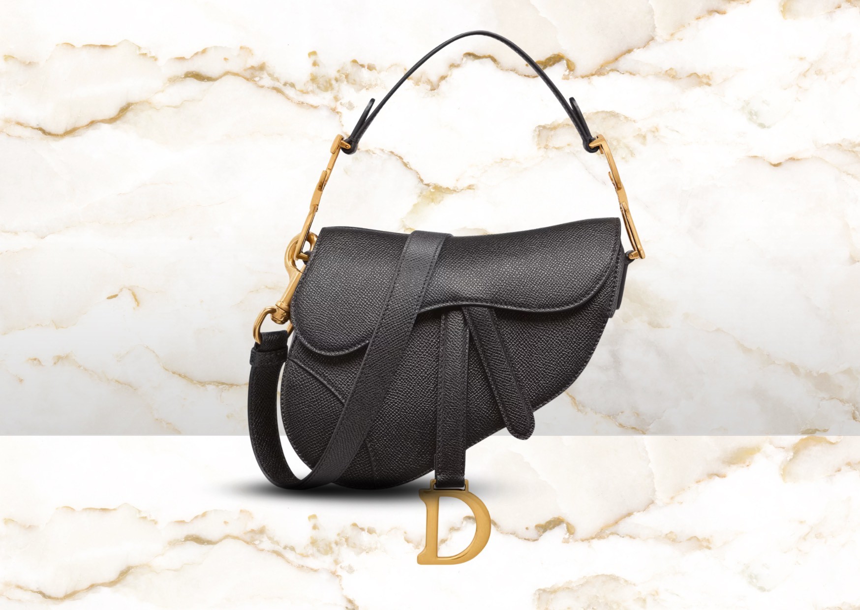 Luxurious designer branded black leather Dior saddle bag, timeless bag, symbol of elegance. Luxury at a discount.