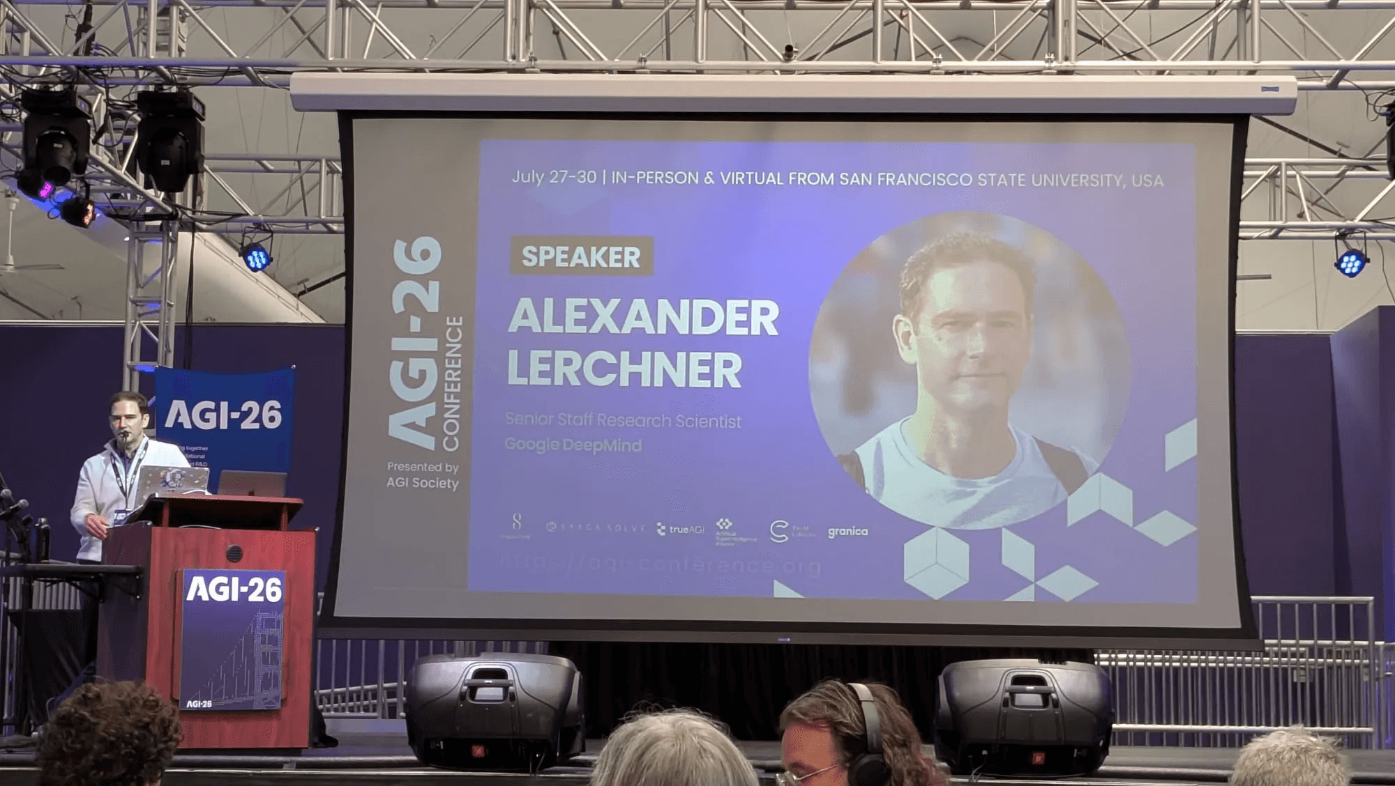 Alexander Lerchner, Senior Staff Research Scientist at Google DeepMind, speaking at the AGI-26 conference in San Francisco