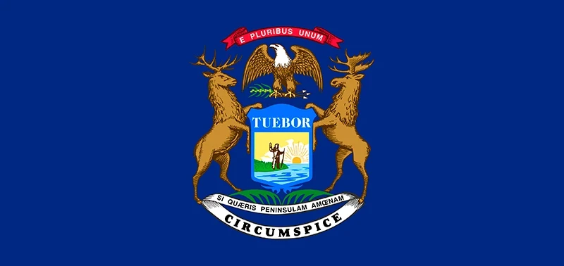 Flag of Michigan featuring a blue field with the state coat of arms. Centered are an eagle, shield, elk, and moose, with banners and Latin mottos.