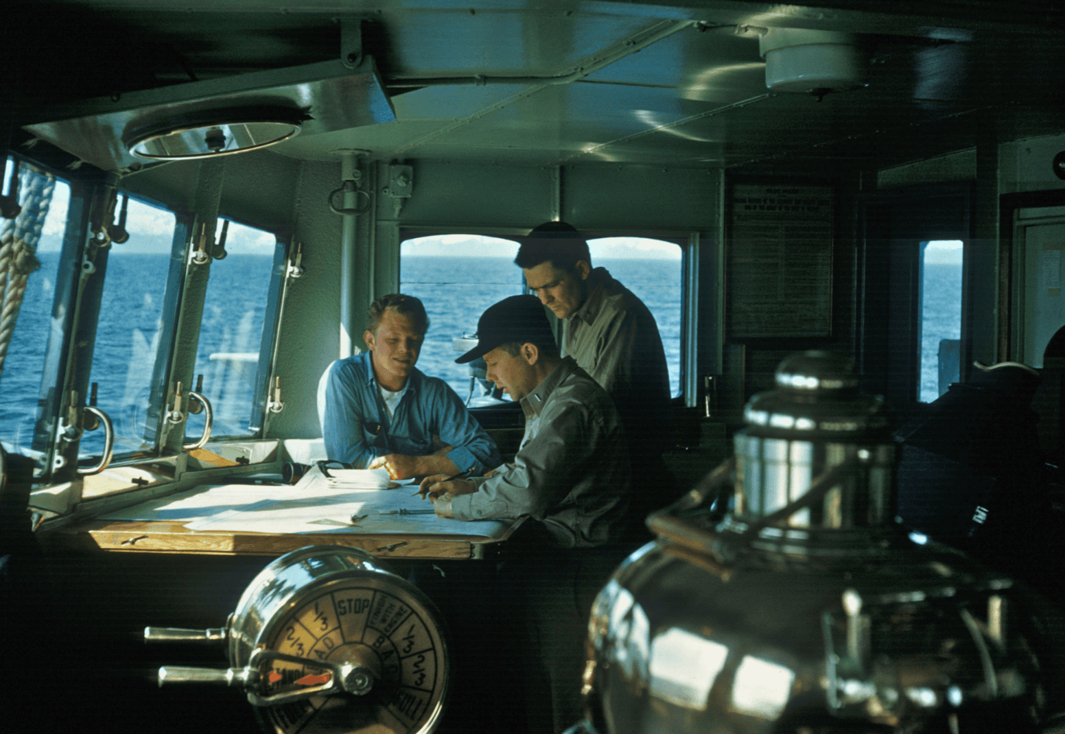 three men navigating