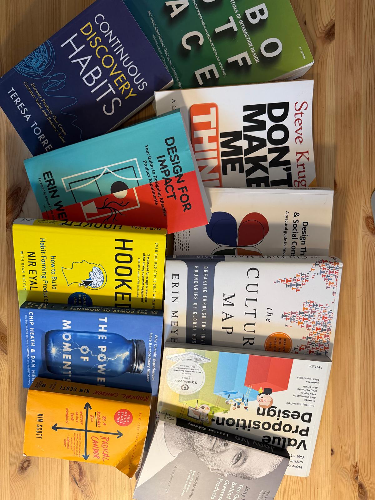 Visual designer in a minimalist studio with an iPad