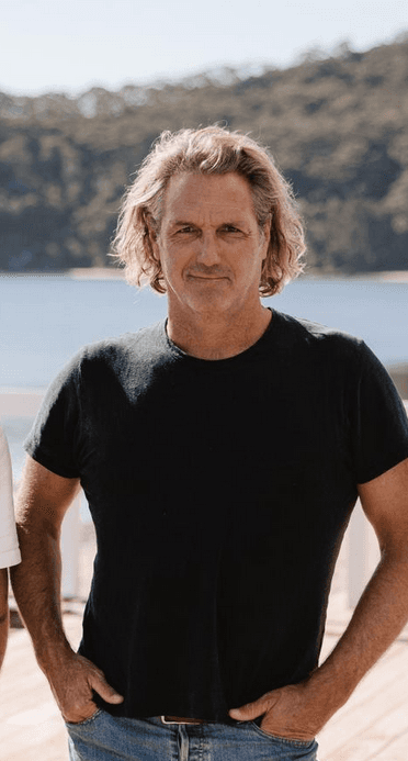 man in black hoodie standing