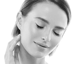 a woman sitting on a chair with her legs crossed