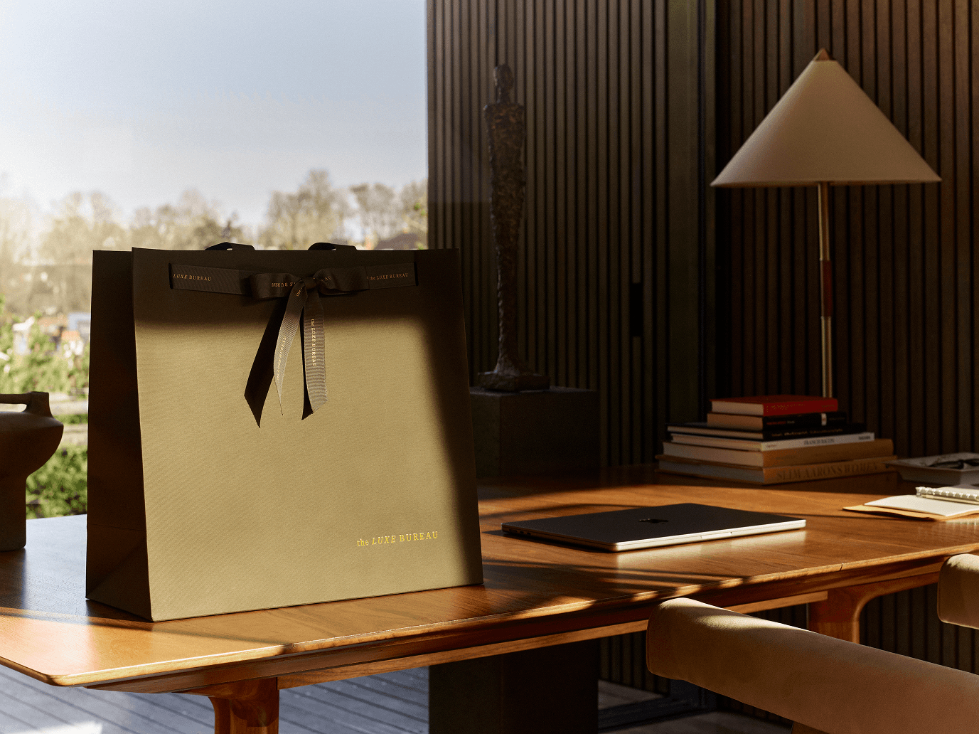 sunlit the luxe bureau gifting bag on desk