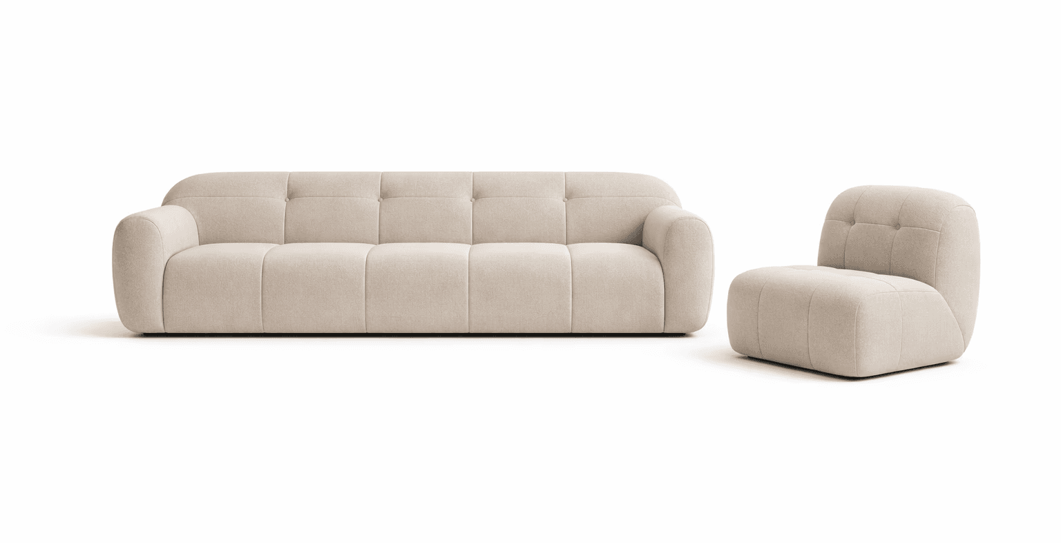 Three‑seater cream upholstered sofa with channel‑tufted cushions and matching armless chair