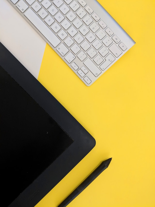 keyboard on yellow table