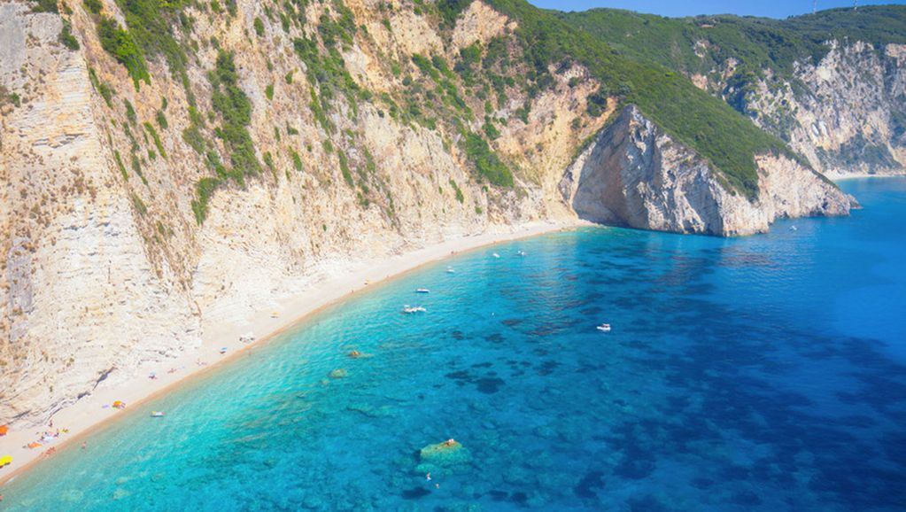 Woman standing on the balcony