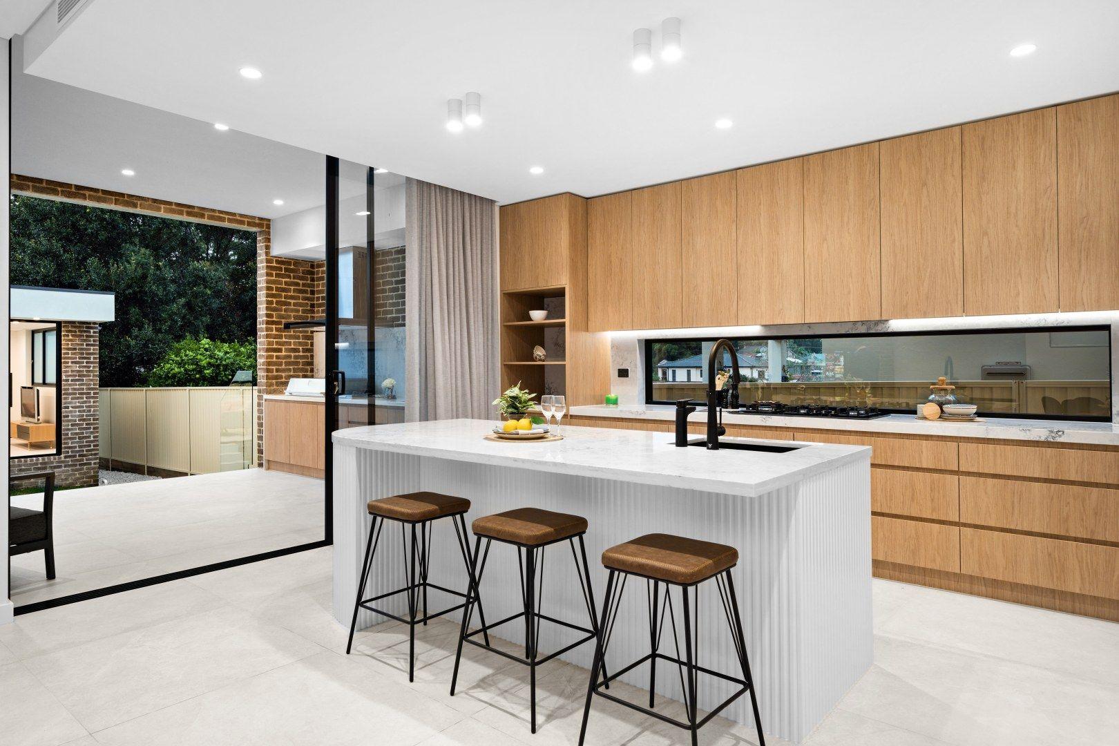 Modern handleless kitchen with timber cabinetry