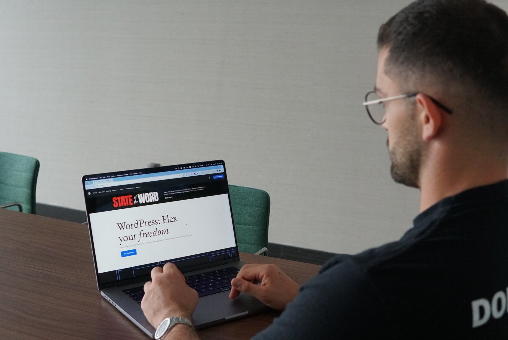 Hristijan Najcheski sitting in front of a laptop