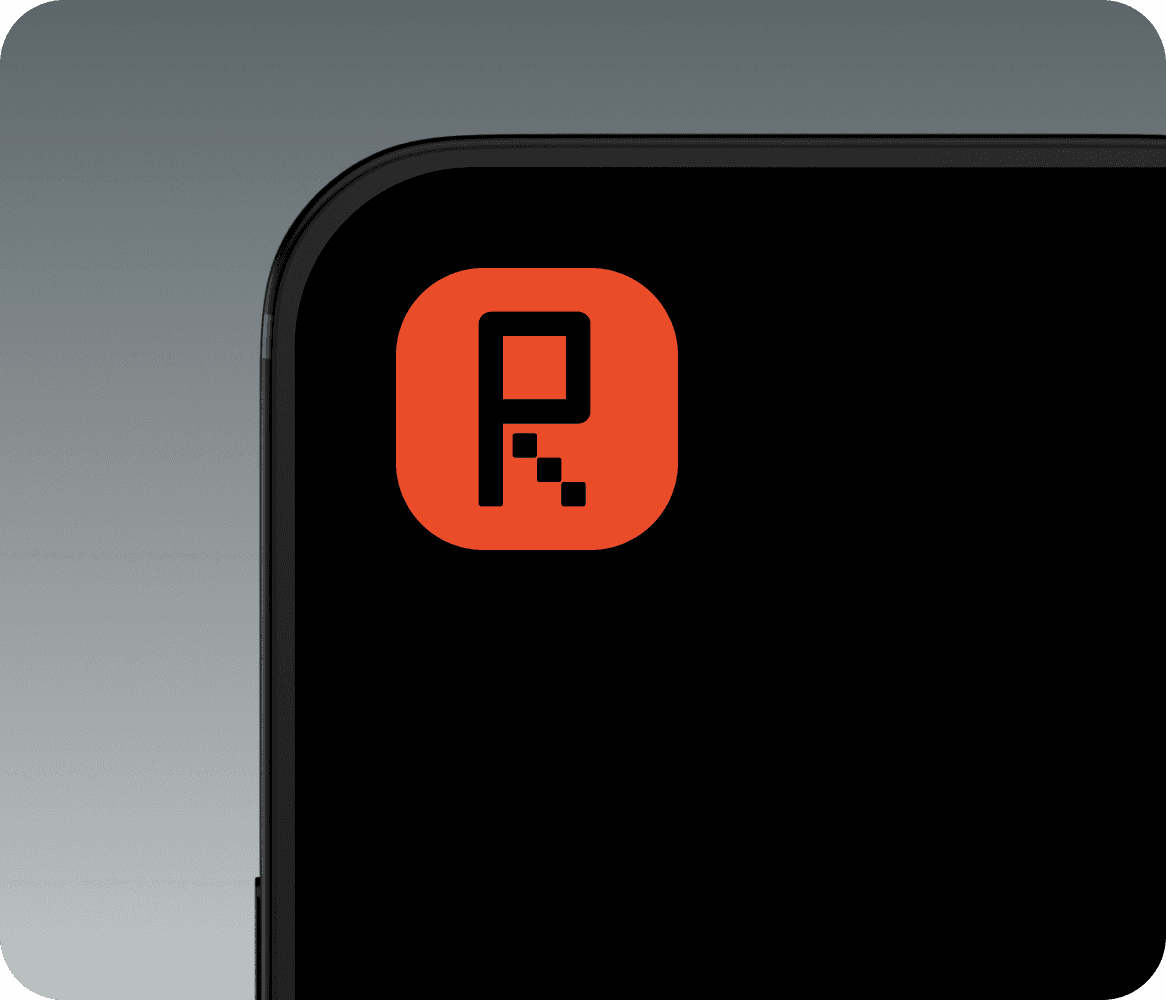 Close-up of a minimalist tech accessory with a bold red "R" logo