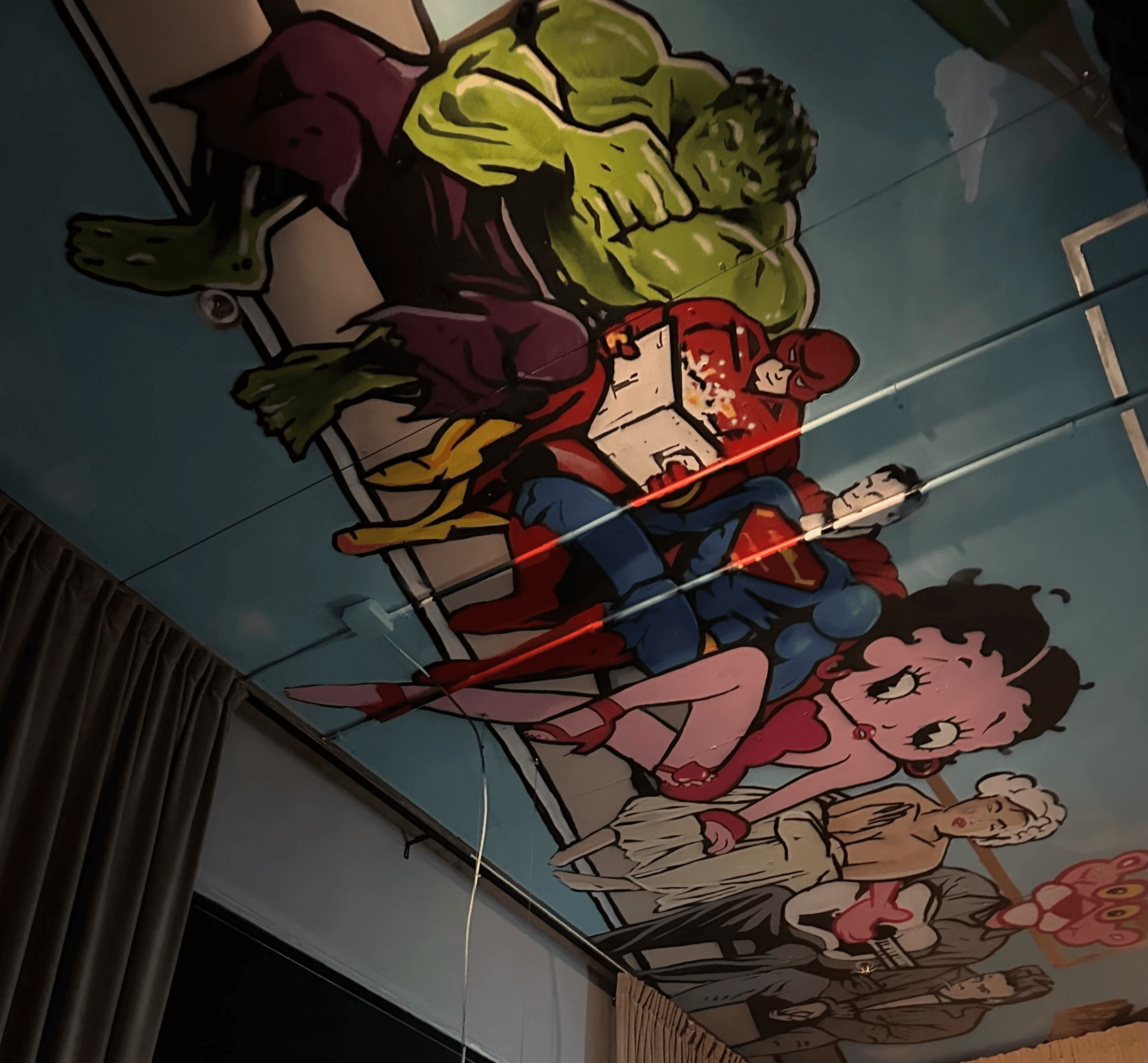 A man and a woman sitting at a bar