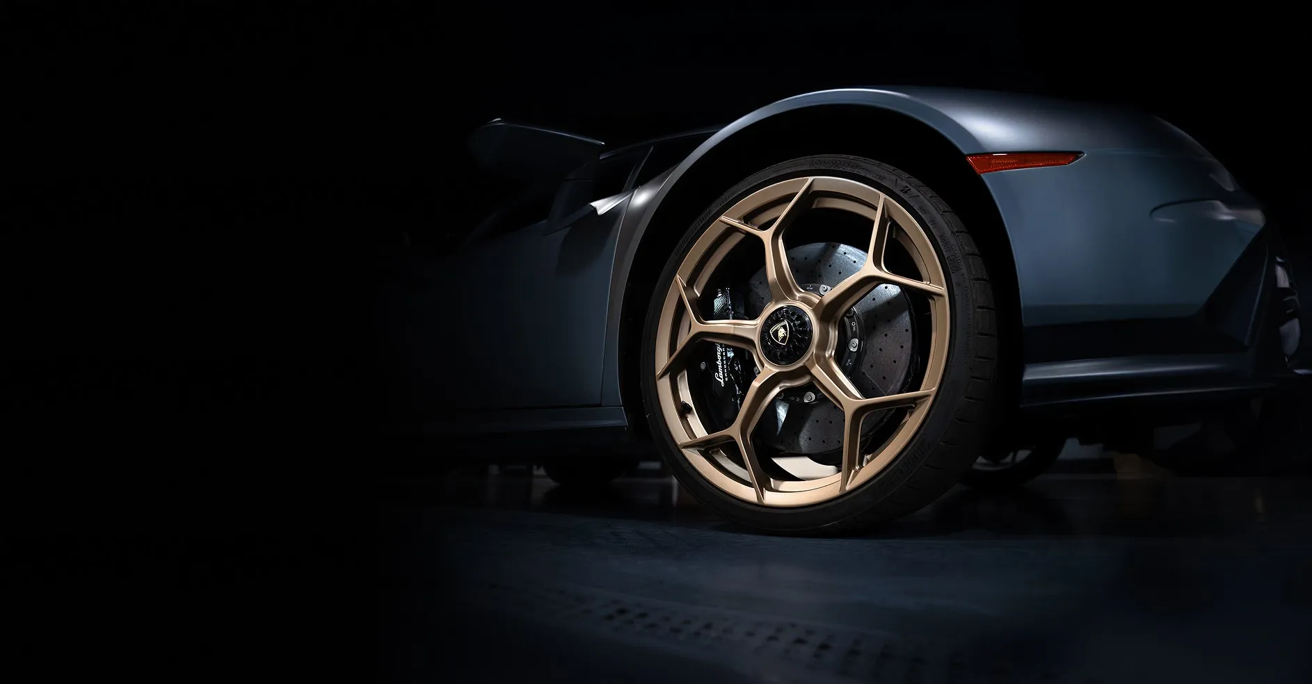 Close-up of bronze powder coated wheel on a luxury sports car