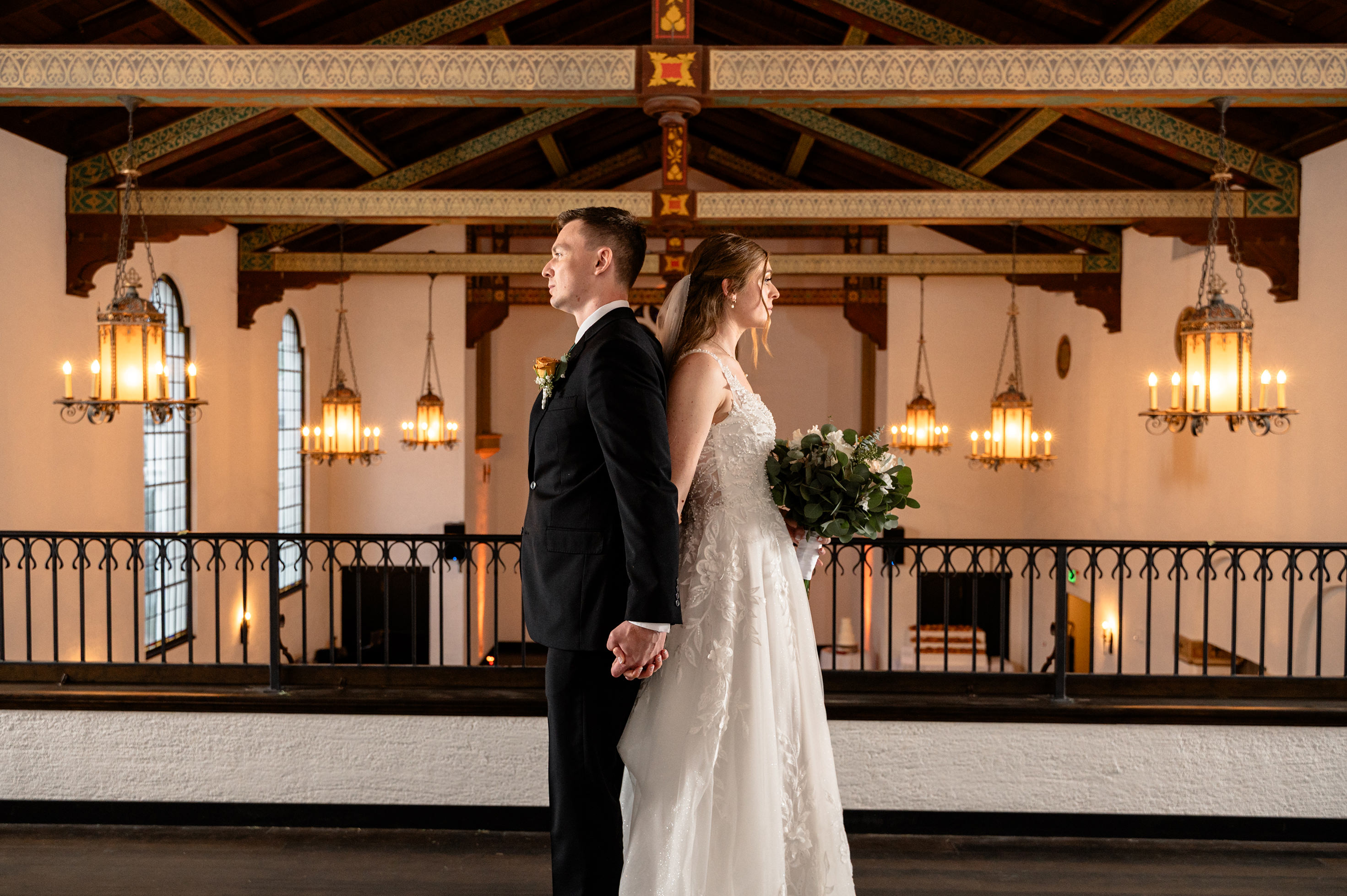 Flat lay wedding details with bouquet, rings, and sparkling bridal heels