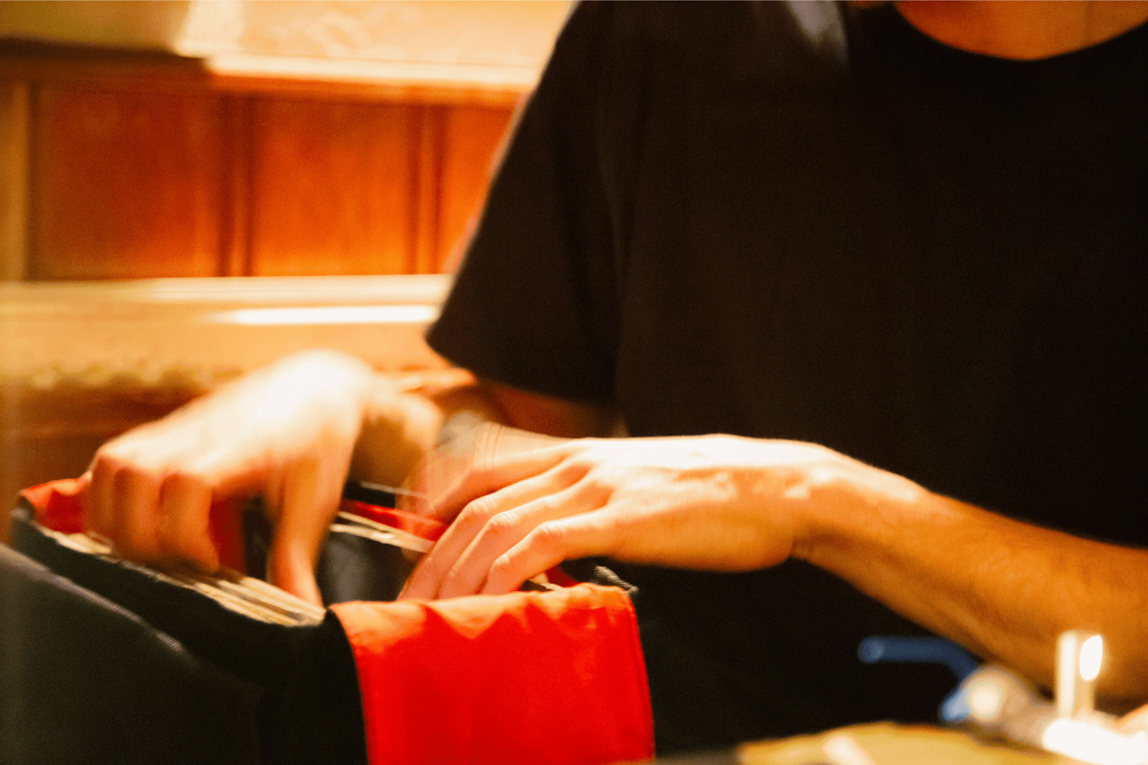 Hands rifling through a record bag in The Bell pub Bristol