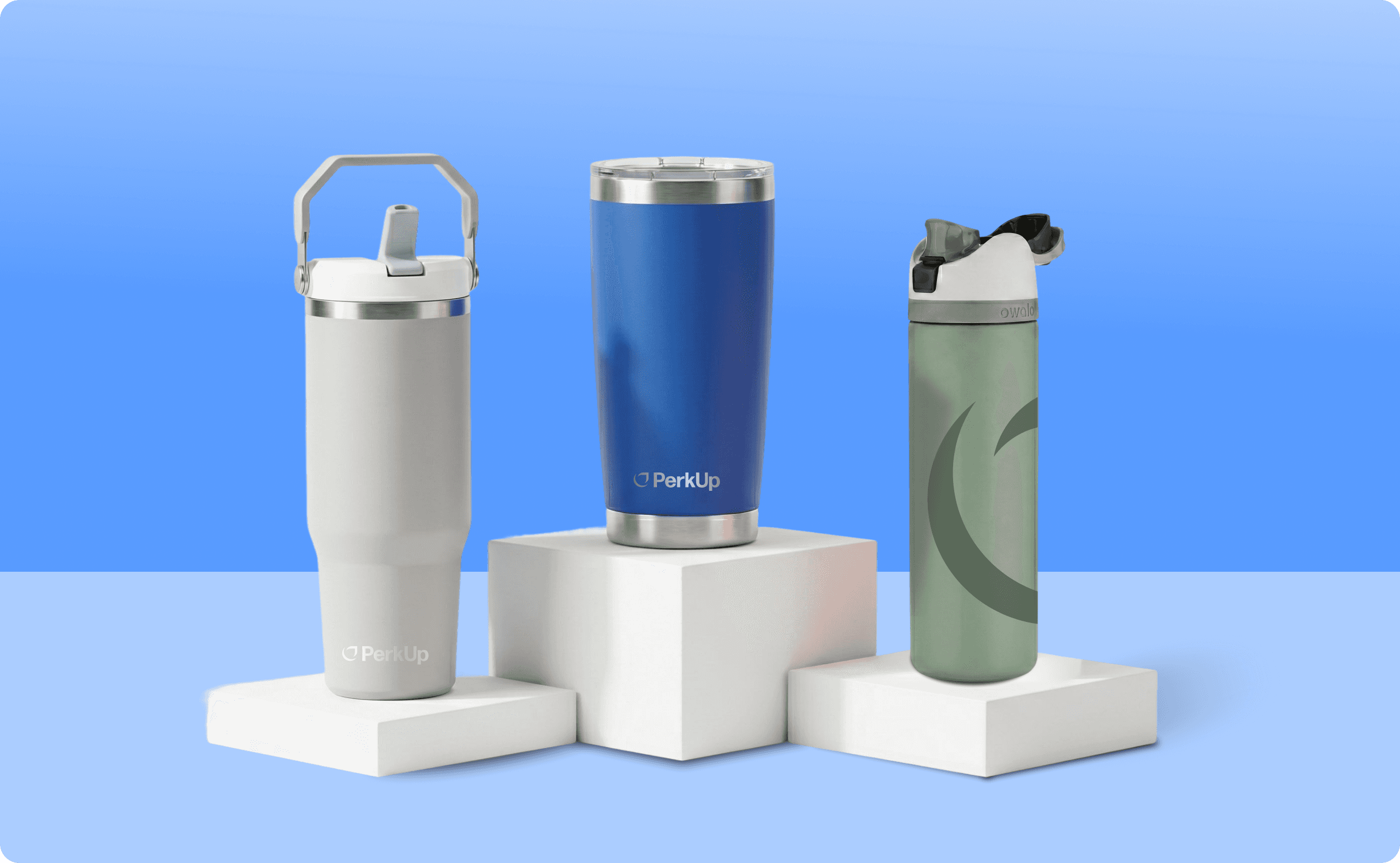 Three insulated tumblers, Stanley, YETI, and Owala.